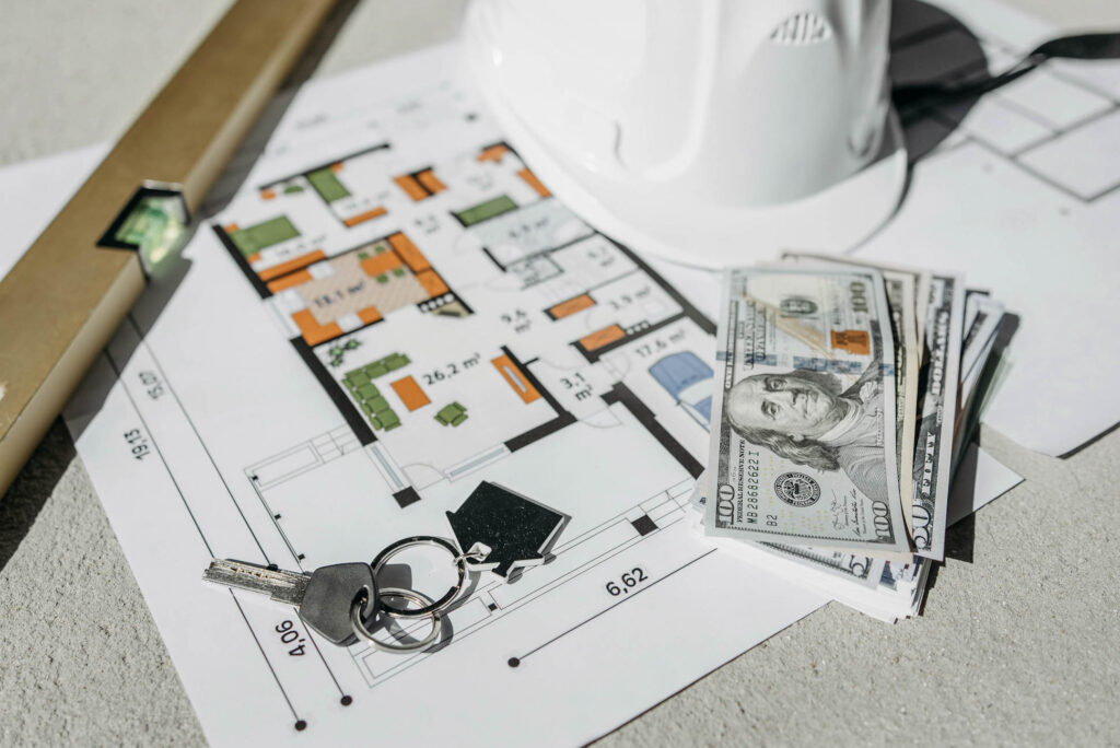 money notes and planning paperwork on a table