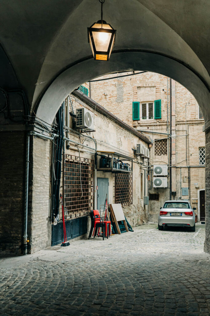 arch and internal courtyard in macerata, italy