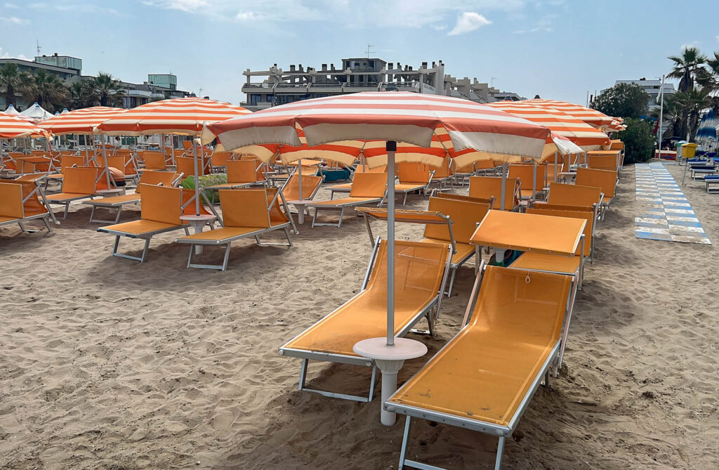 orange sunbeds in Porto san Giorgio, Italy