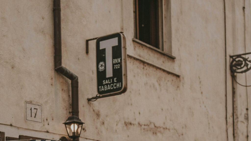 Tabacchi sign, Italy - white T letter on blue background 